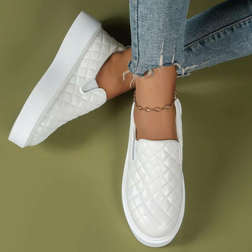 ELITE CASA Slip-On Lightweight Platform Loafers in white, elegantly styled with quilted design and paired with denim.