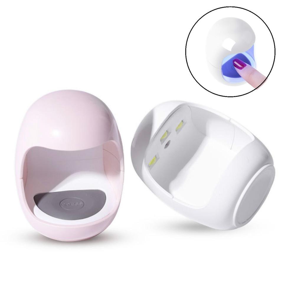 ELITE CASA Mini 3W USB One-Finger UV Nail Lamp in pink and white for efficient nail curing.