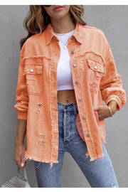 ELITE CASA Tattered Jacket in vibrant orange, styled with a crop top and jeans for a trendy casual look.