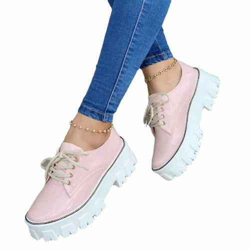 ELITE CASA Thick Heel Flat Platform Oxford Shoes in pink worn with blue jeans, showcasing stylish and comfortable footwear.