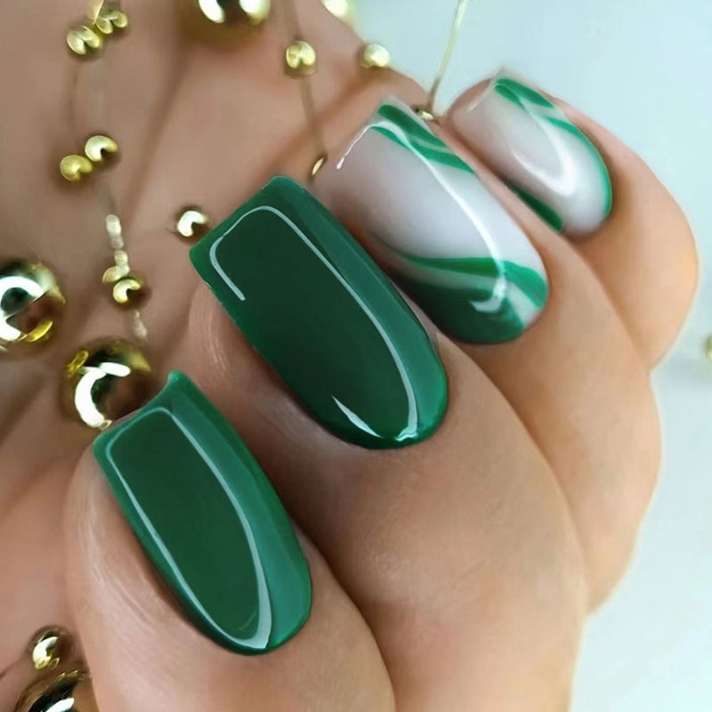 ELITE CASA Press-On Nails Kit featuring green nail designs and glossy finish for stylish nails.