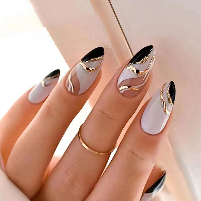 ELITE CASA Reusable Stick-On Nails Kit with stylish black and gold design, showcasing stunning manicure with elegance.