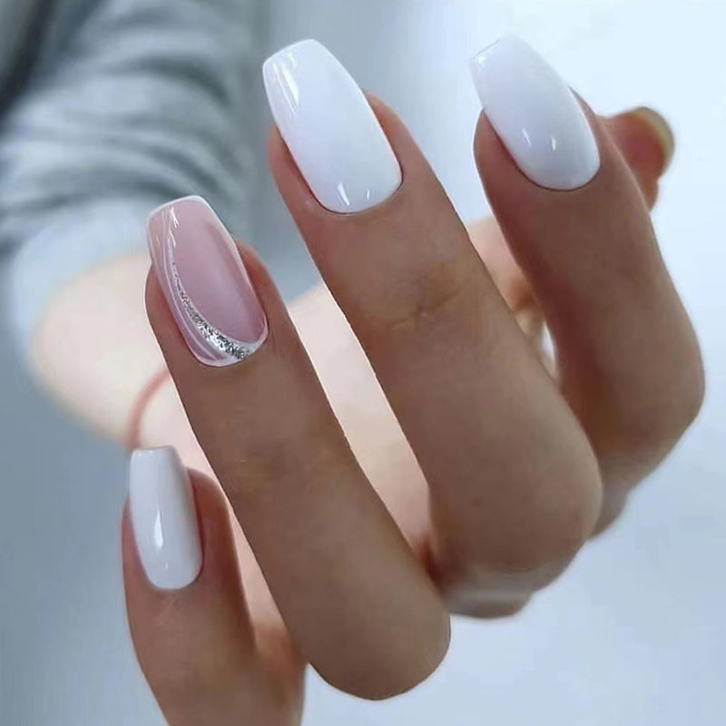 Elegant nails with white polish and a stylish design, part of the ELITE CASA Press On Nails Kit.